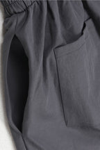 Lapel Sleeveless Buttoned Cargo Jumpsuit Lavish Daily